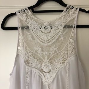 Mid length embroidered off white dress